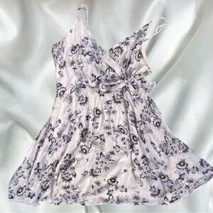 Fairy grunge A-line paisley surplice dress with swiss dot detailing